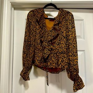 Cheetah ruffle v neck blouse